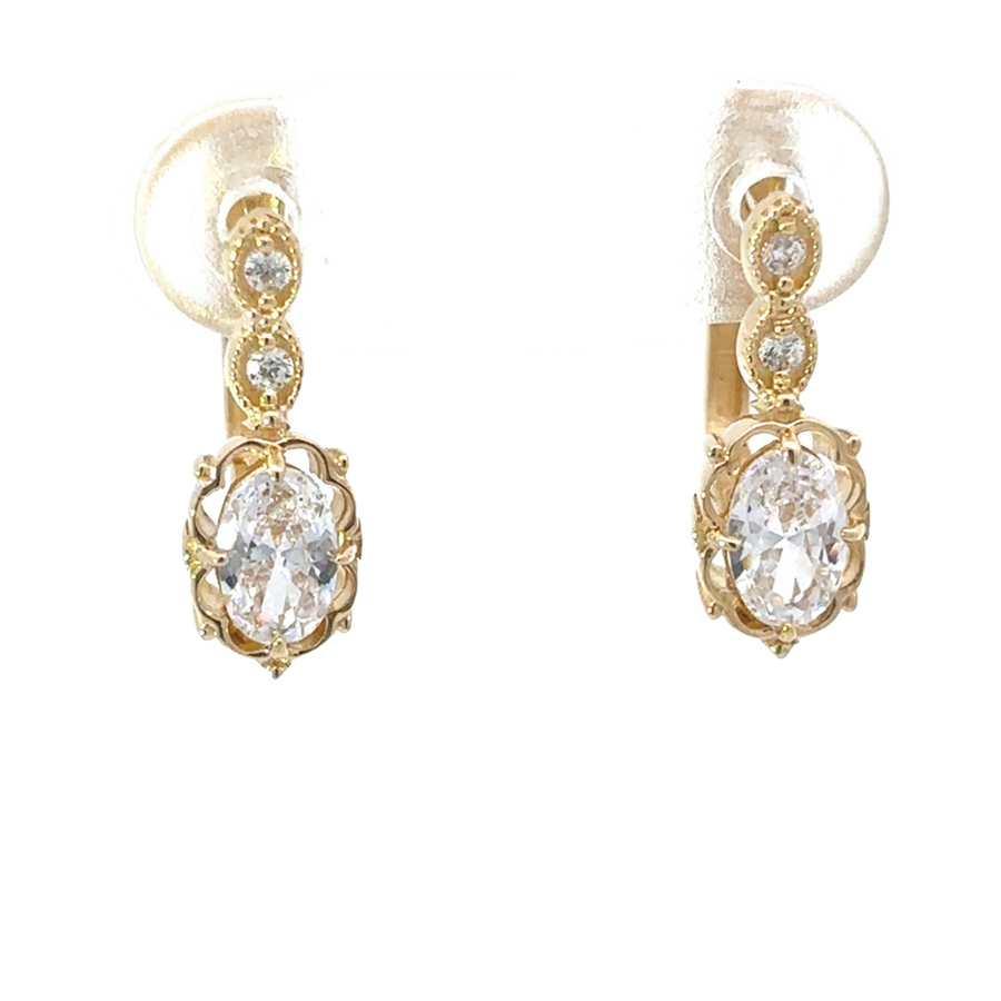 Gift box presentation of 14k gold jewelry set, featuring ring, necklace, and earrings with oval stones.