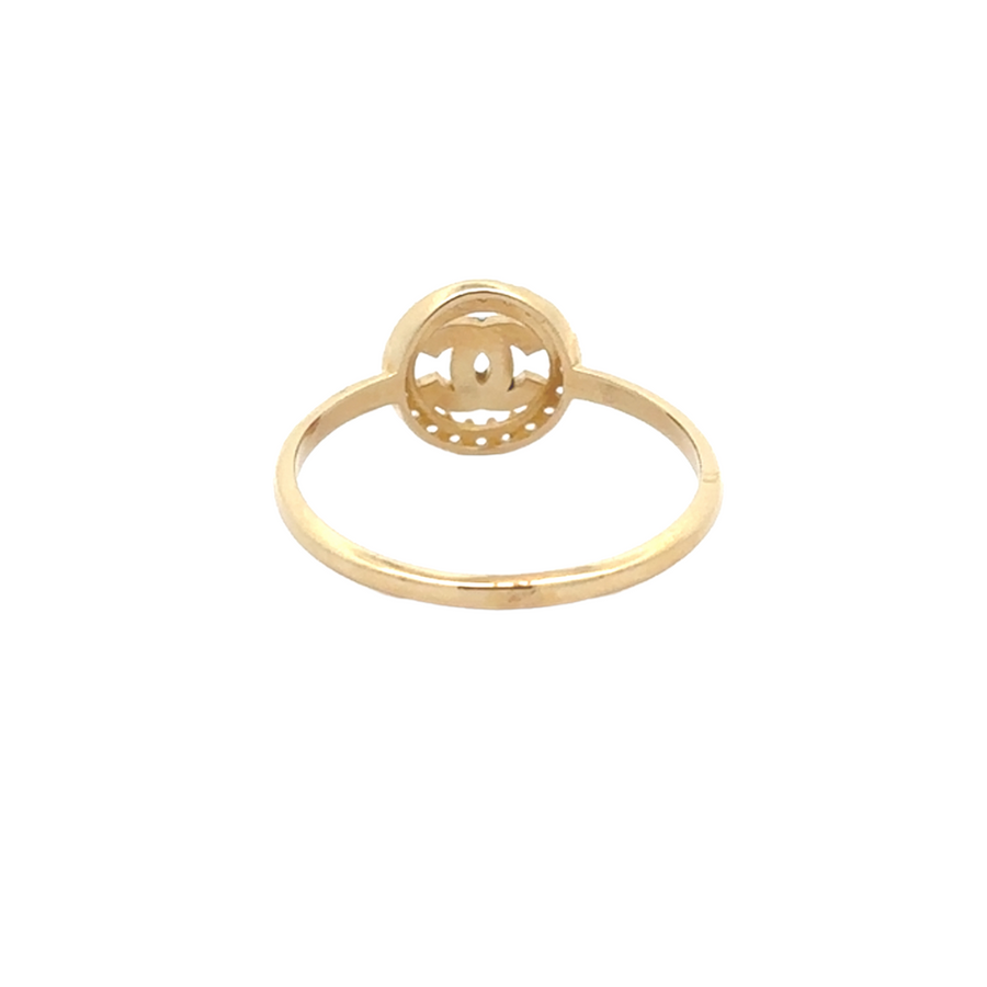Elegant ring displayed on a beige fabric backdrop