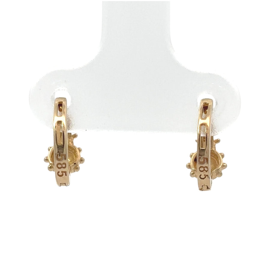 Elegant baby-safe gold earrings shaped like handbags