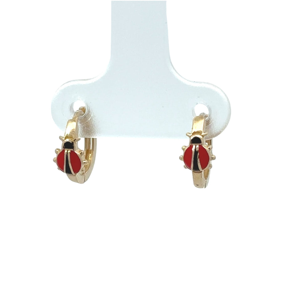 14k gold lady bag earrings shown on white background