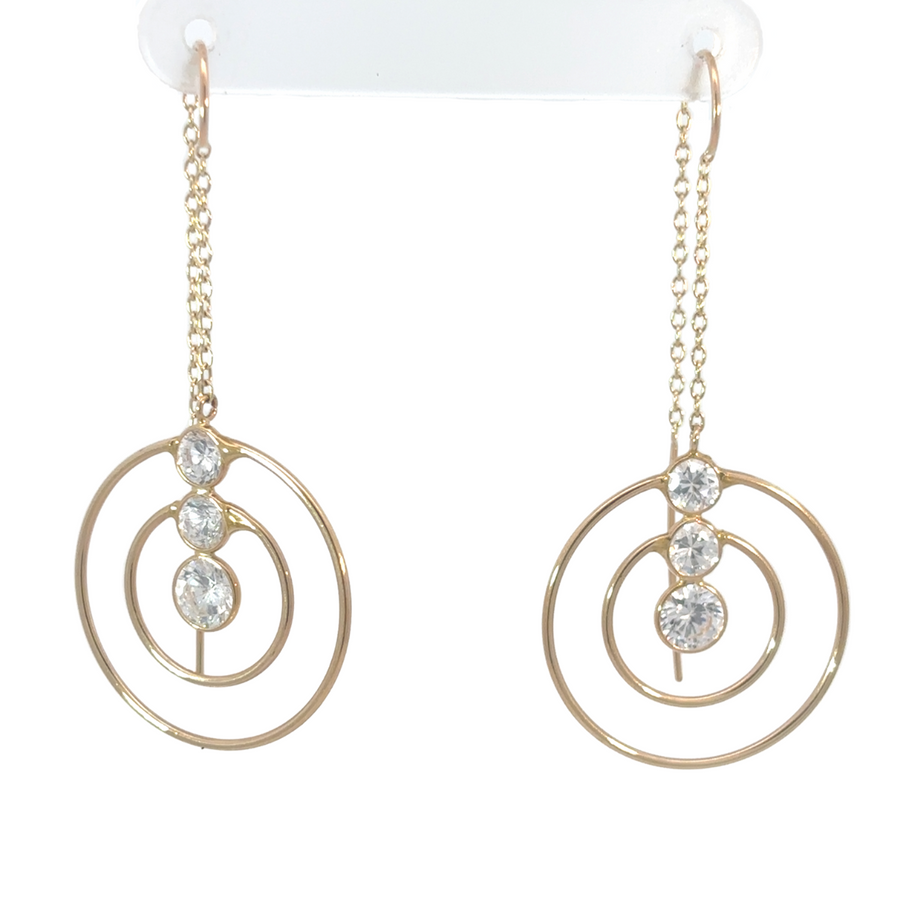Elegant large hoop-style gold earrings with cubic zirconia