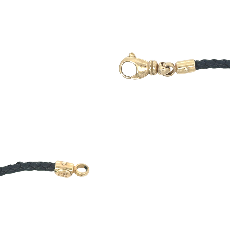 14k gold and leather men's bracelet stacked with other accessories for a bold look