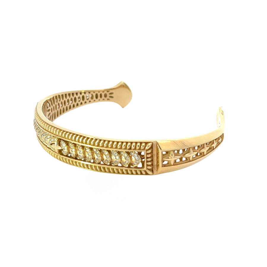 Men's 14k gold open bangle jewelry on white background