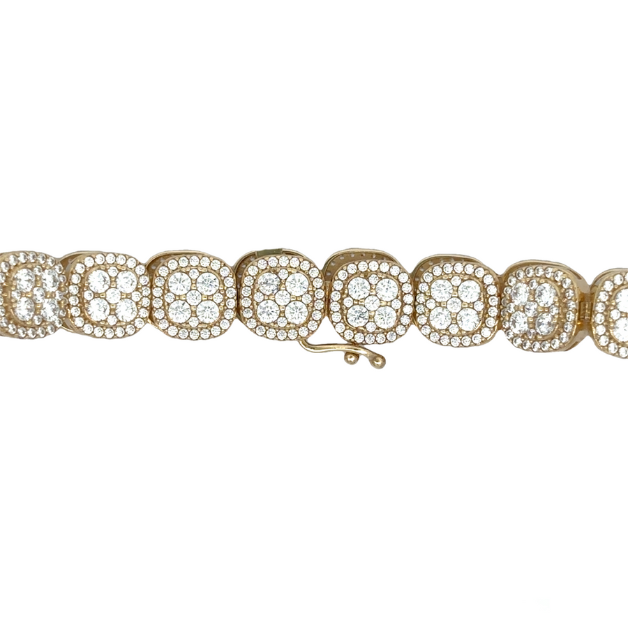 Bracelet laid flat highlighting gold links and stone accents