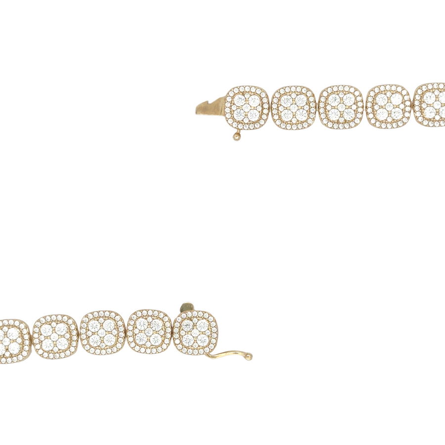 Bracelet wrapped around wrist paired with other gold jewelry