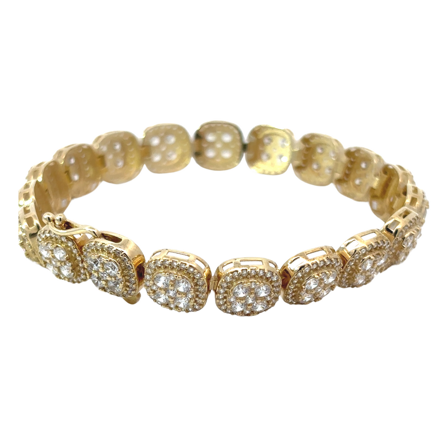 14k gold multi-cuad bracelet with CZ stones on white background