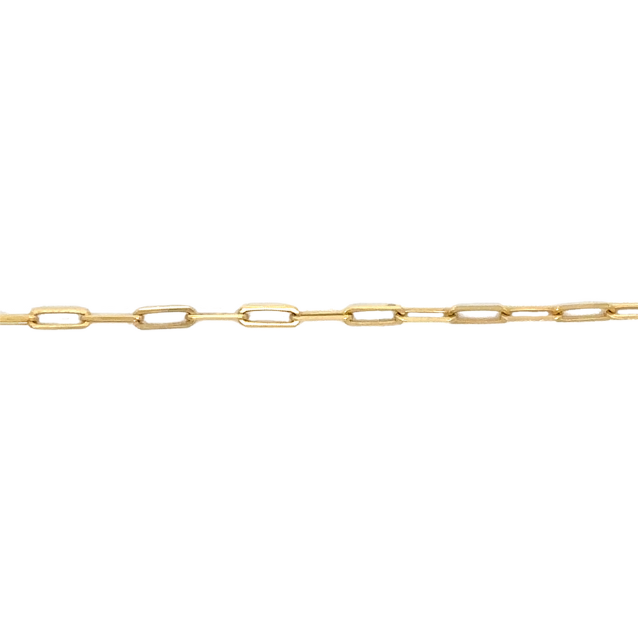 14k gold necklace draped over a jewelry stand