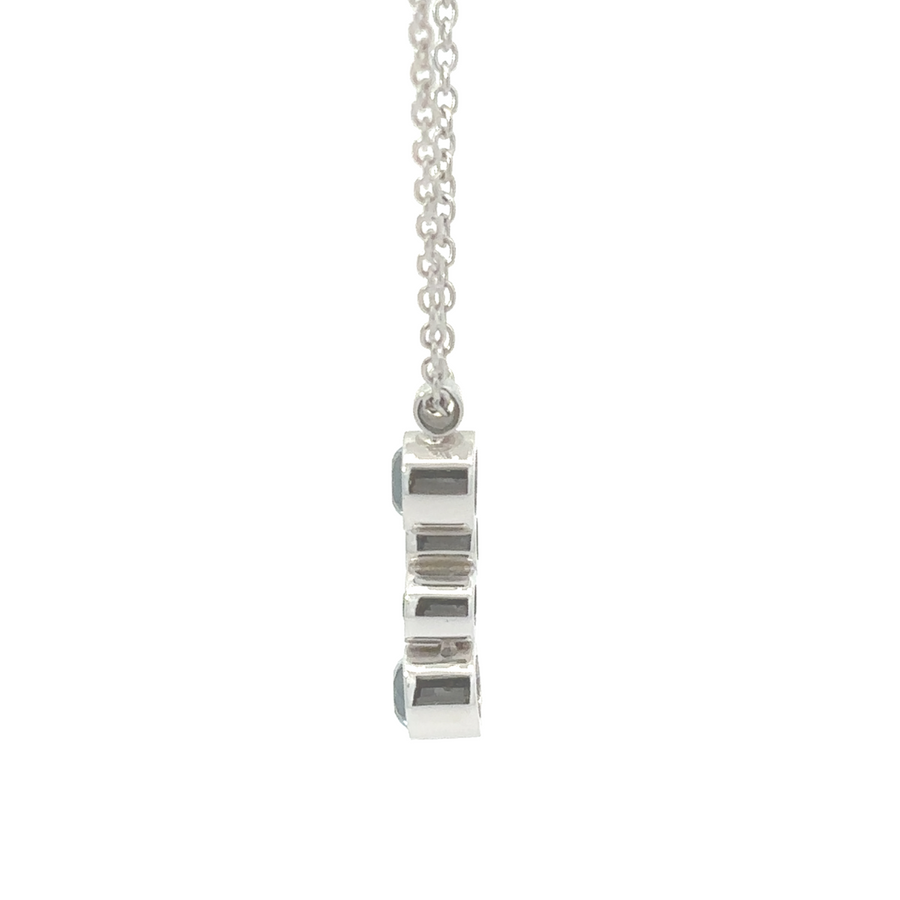 Close-up of diamond-studded 14k gold necklace and earrings
