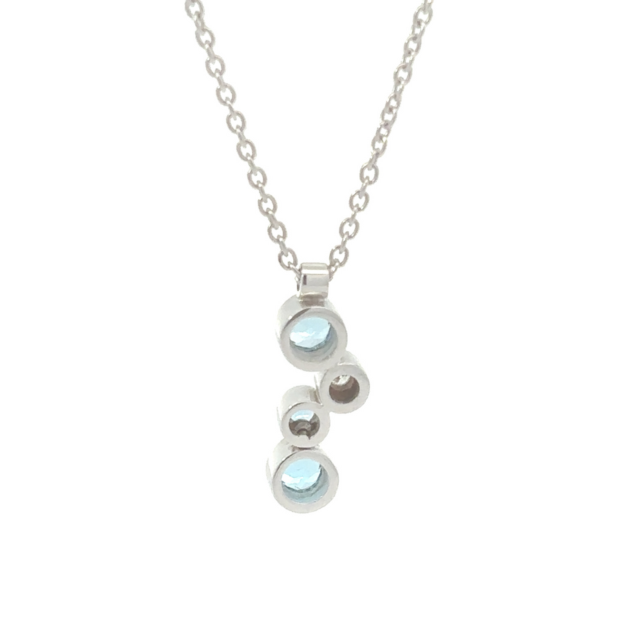 Necklace and earring set resting in jewelry display box