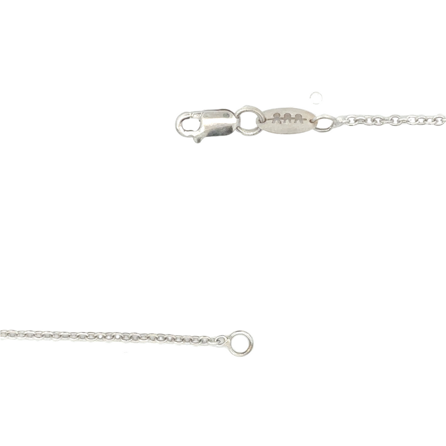 Side view of gold earrings with brilliant diamonds