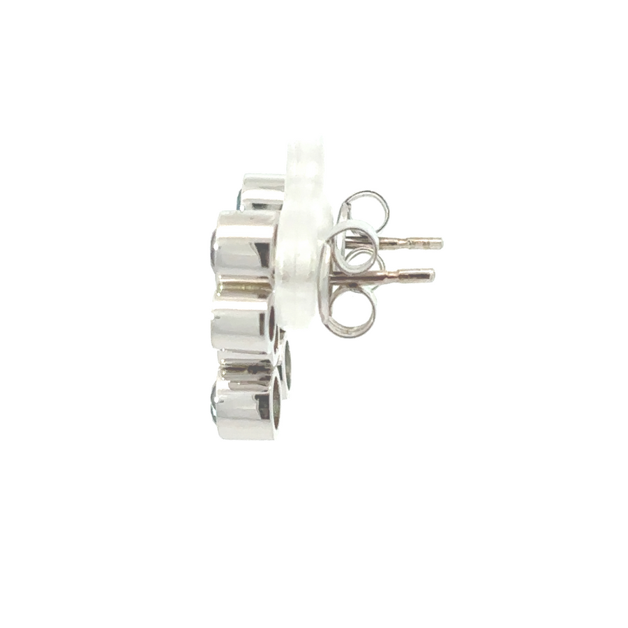 Matching gold necklace and earrings set on a white background