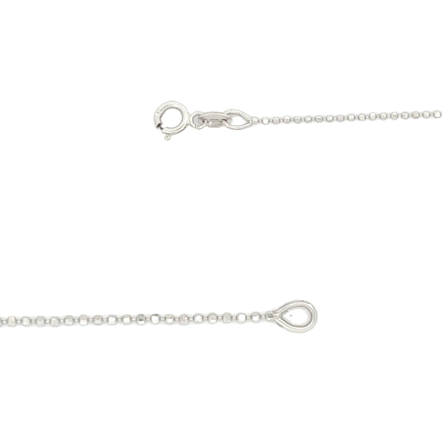 Model wearing 14k gold necklace with 0.04 CT diamonds