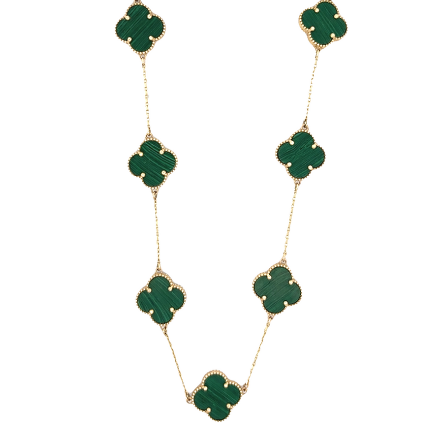14k gold necklace with ten green accents displayed on a white background