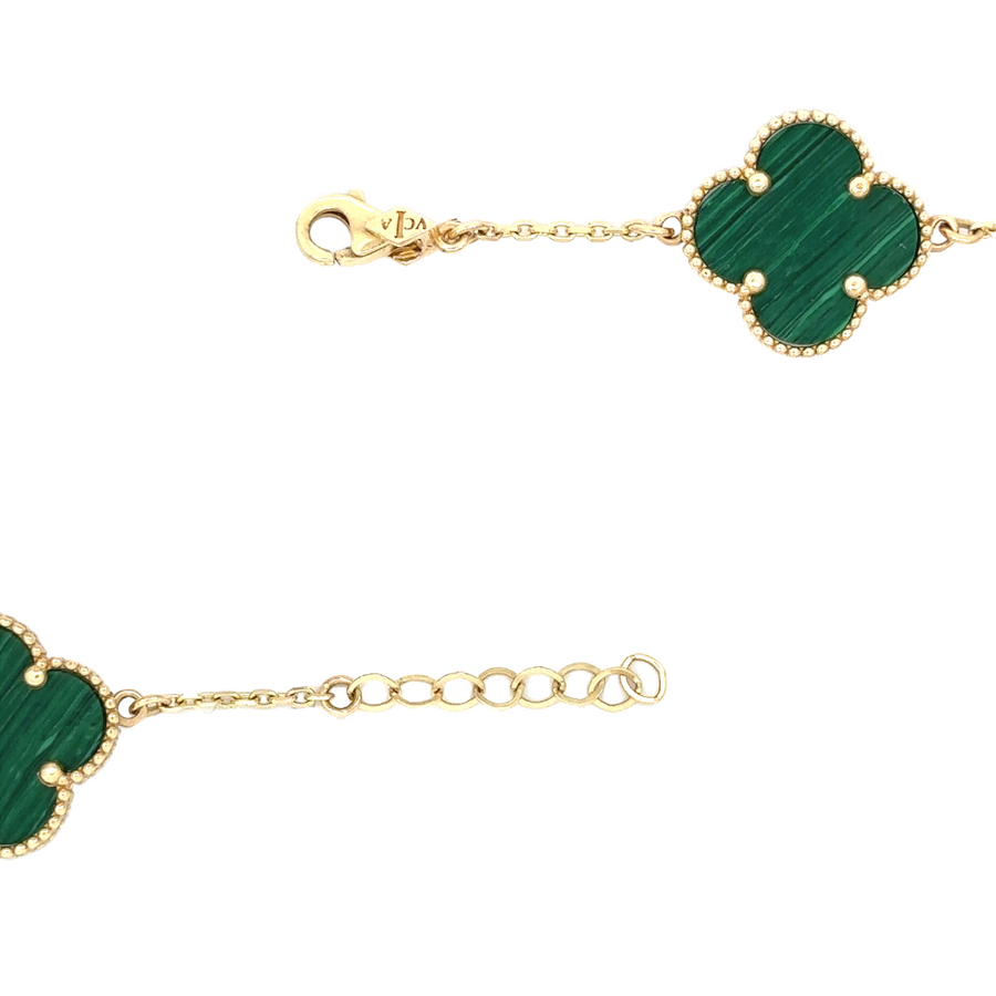 Gift box presentation of 14k gold necklace with green embellishments