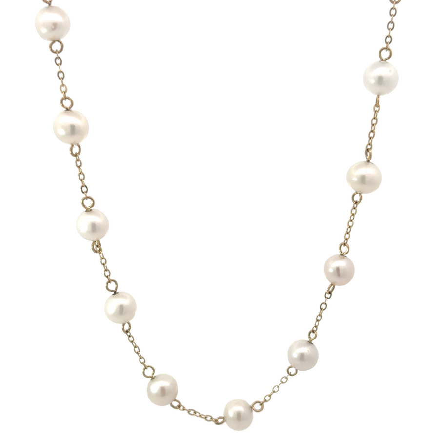 14k gold necklace with 32 pearls displayed on jewelry bust