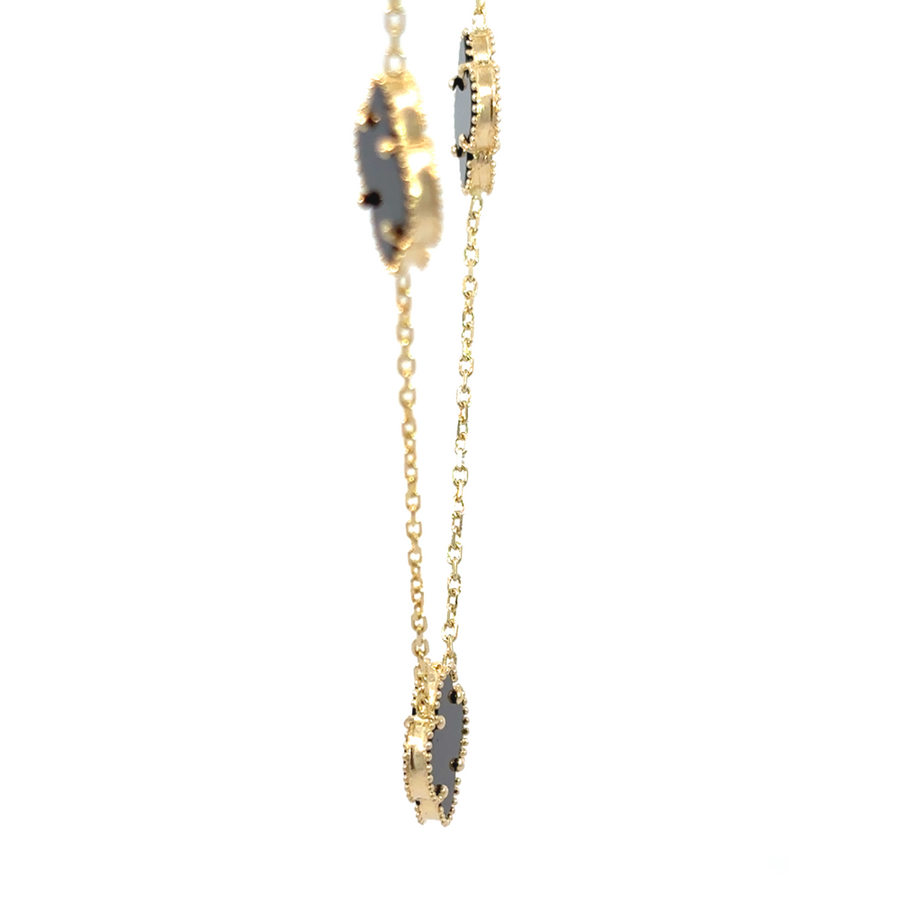 Necklace displayed flat to show stone spacing and chain style