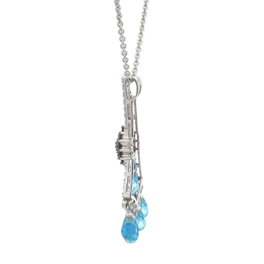 Close-up of diamond and black/blue gemstone necklace