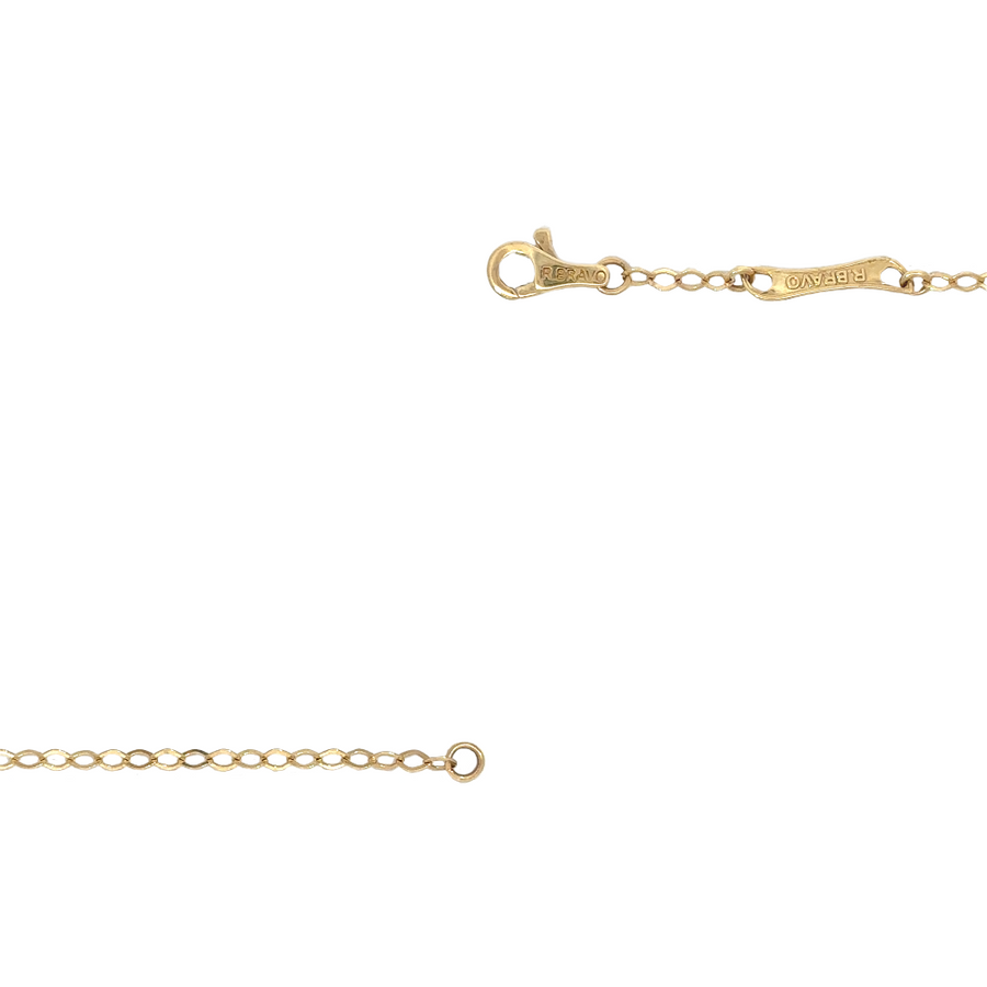 Minimalist gold necklace with black pendant, ideal for modern style