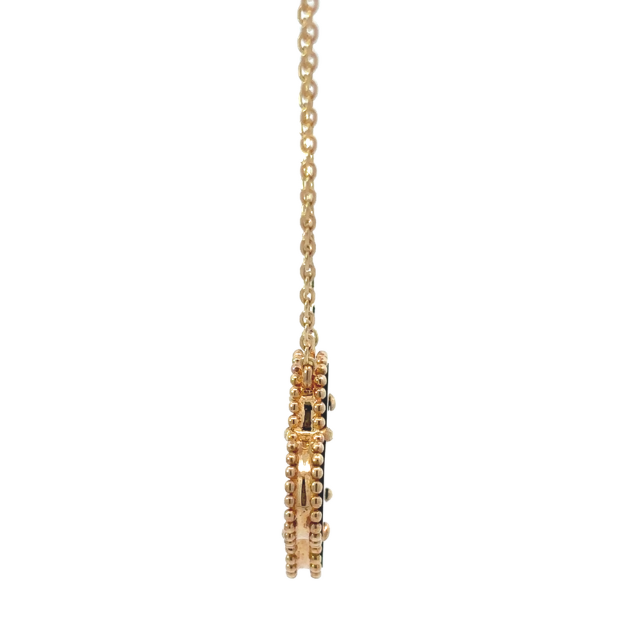 Woman wearing the gold necklace adjusted at 16.5" length for a snug fit