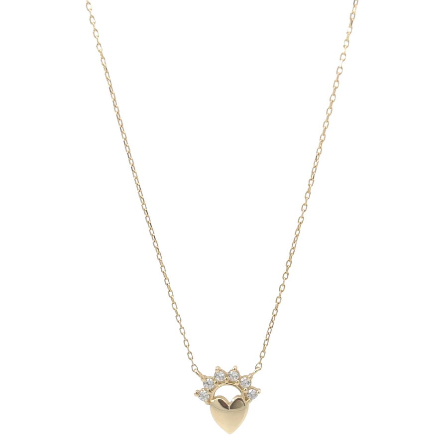 Close-up shot of the 14k gold necklace with a heart charm at the center, highlighting its delicate design.