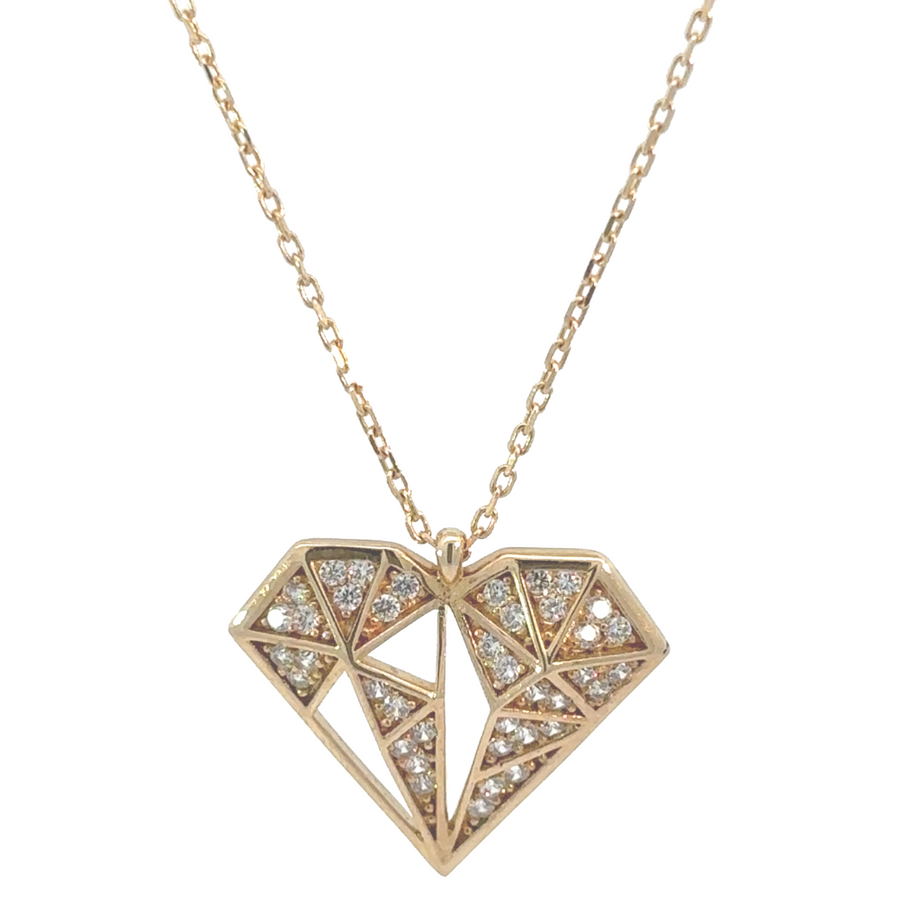 14k gold necklace with diamond-inspired CZ stones displayed on a velvet background