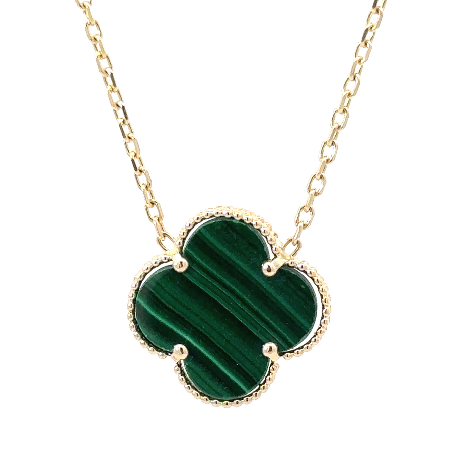 14k gold necklace with green pendant on plain white background