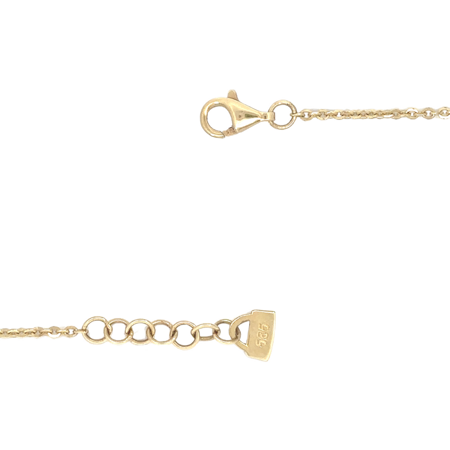 Timeless 14k gold necklace with delicate pendant on a woman's neckline