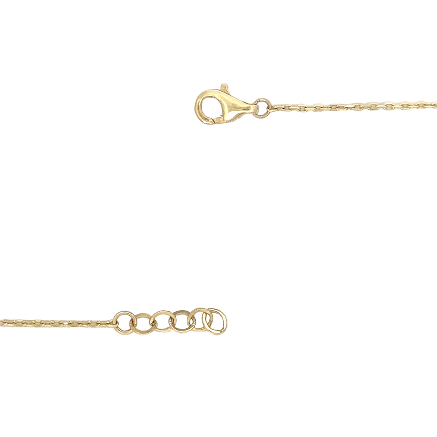 Model wearing 14k gold necklace with red accent, styled with a casual outfit for everyday elegance.