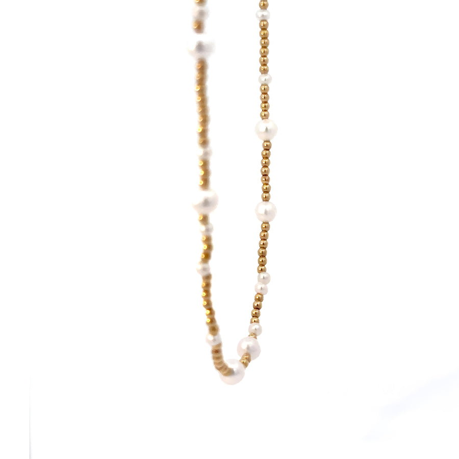 Adjustable gold necklace with elegant white pearl