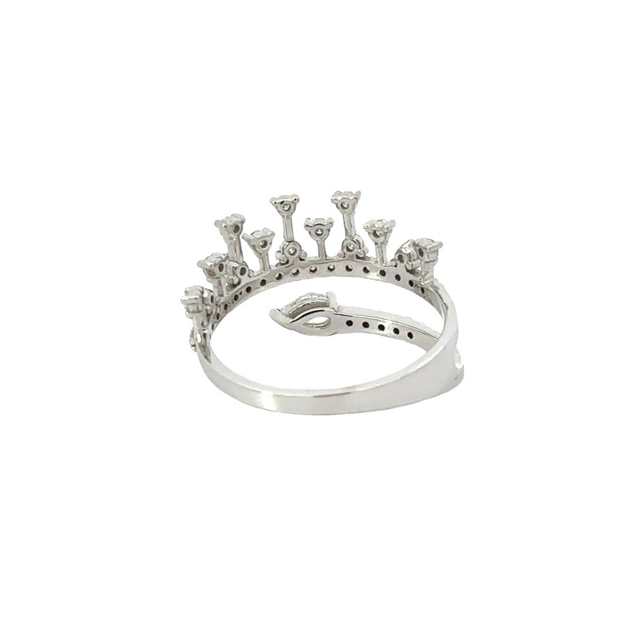 Ring displayed on velvet background showcasing crown silhouette