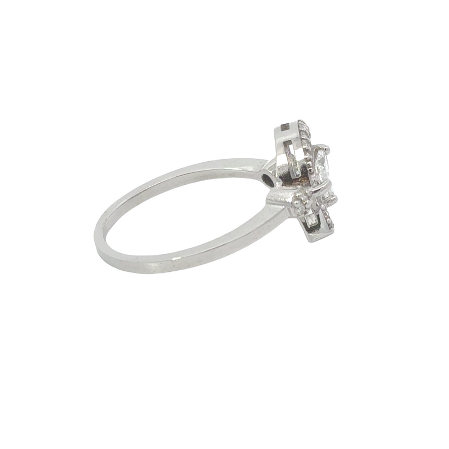 Modern gold ring featuring two oval diamond shapes