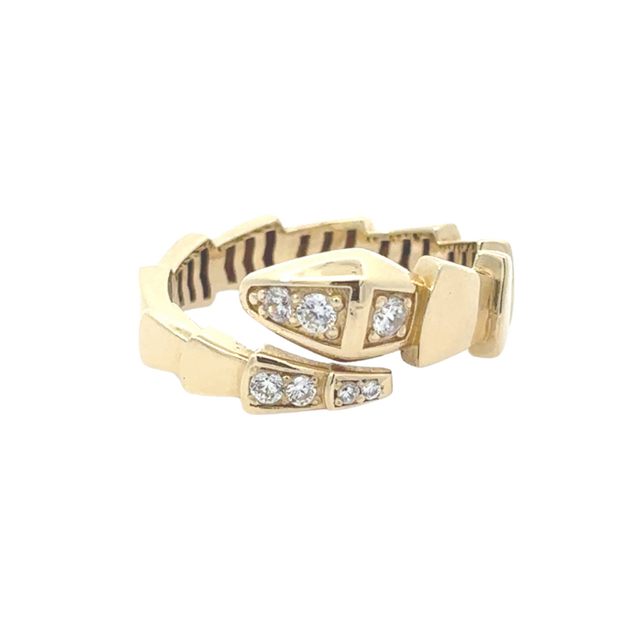 Model wearing 14k gold open ring with sparkling cubic zirconia stones