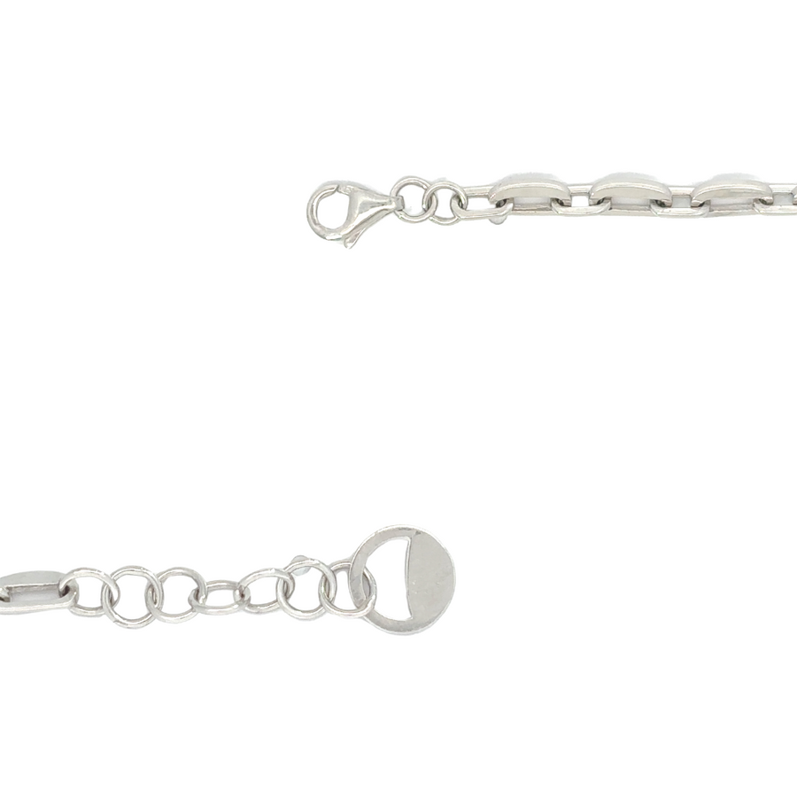 Close-up of diamond-studded gold bracelet oval shape