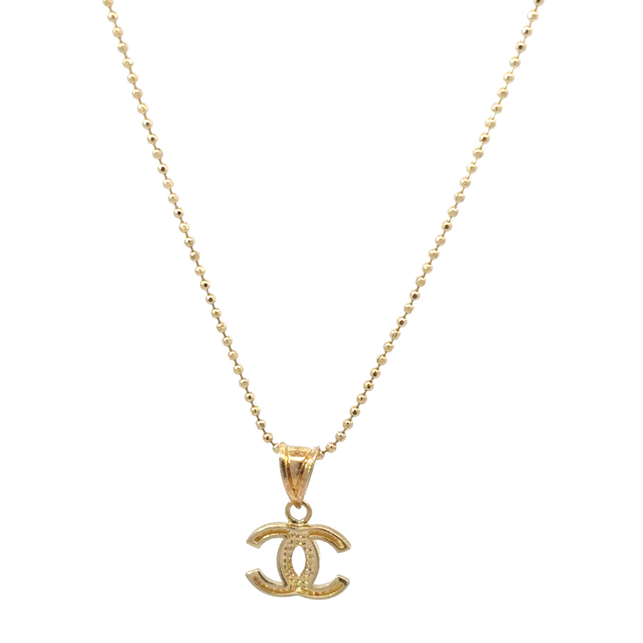 14k gold pendant displayed on a delicate chain for layering