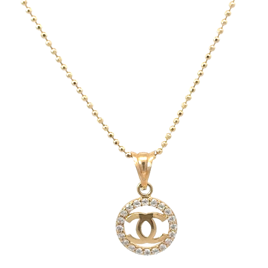 14k gold unisex pendant with brilliant CZ stone on white background