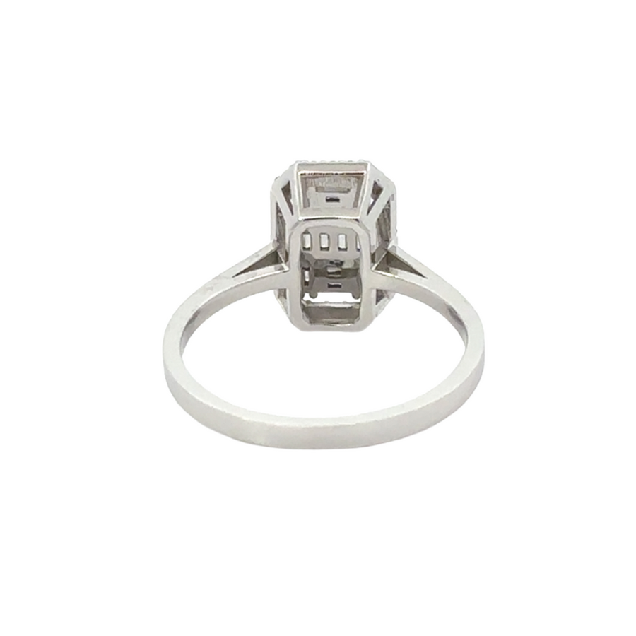 Flat-lay of 14k gold rectangular diamond ring, highlighting the sparkling diamonds