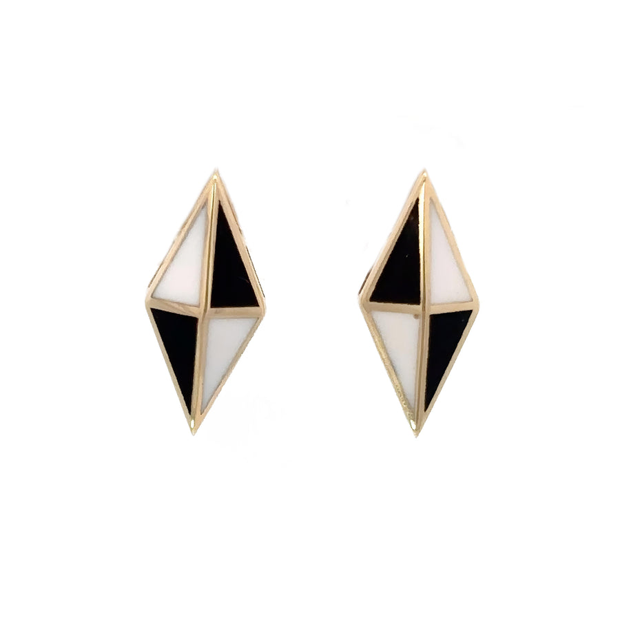 Close-up of 14k gold rhombus stud earrings with black and white accents
