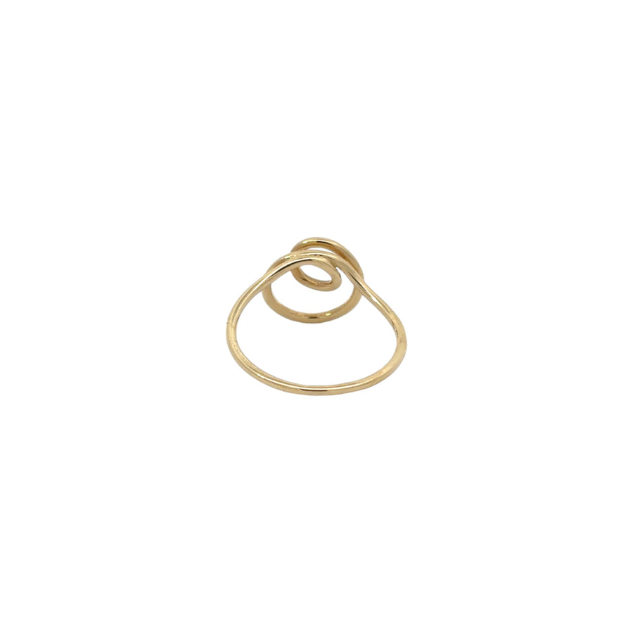 Woman wearing a size 7 gold ring on ring finger
