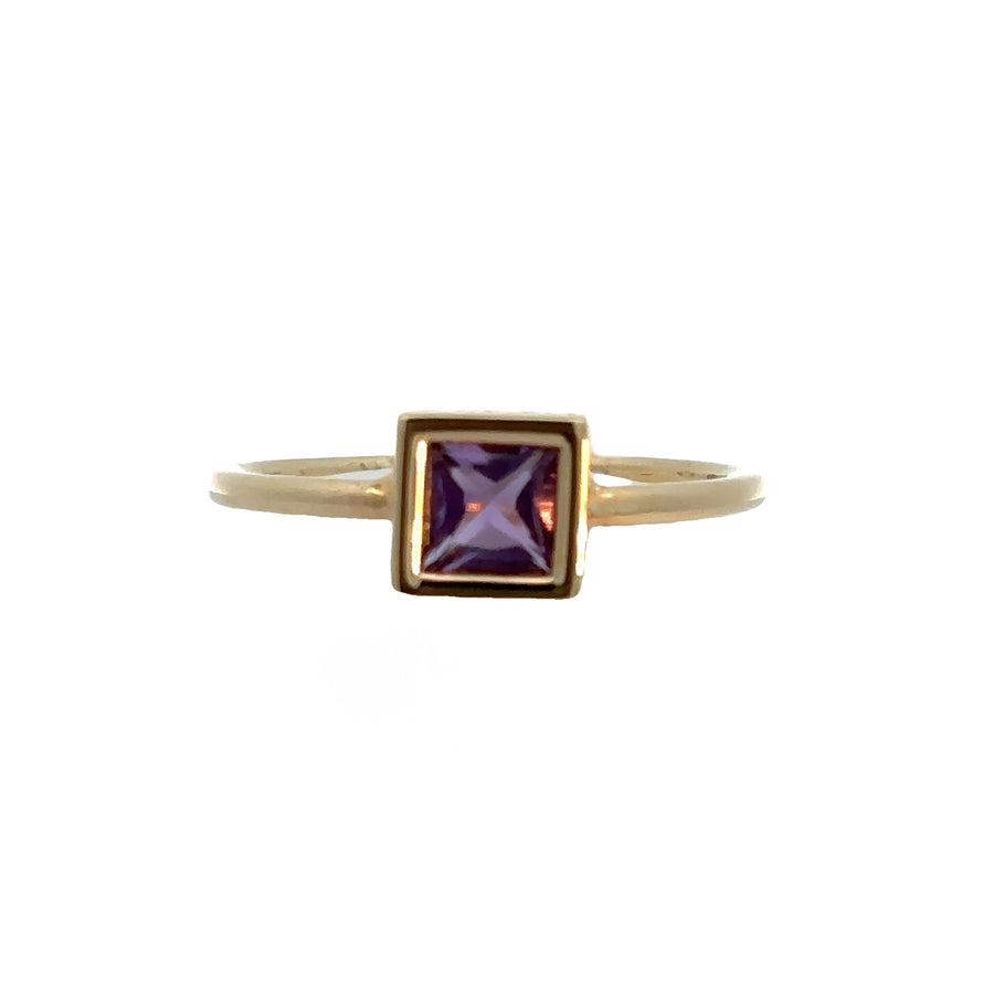 Close-up of amethyst gemstone set in 14k gold ring size 7
