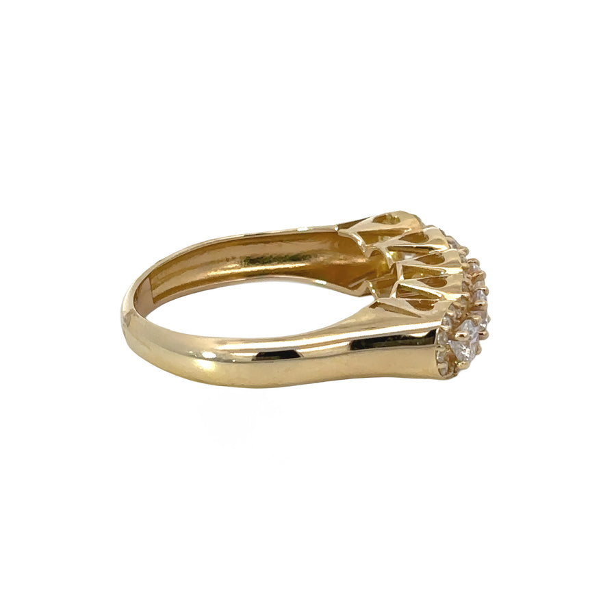Side view of 14k gold ring featuring a clear CZ