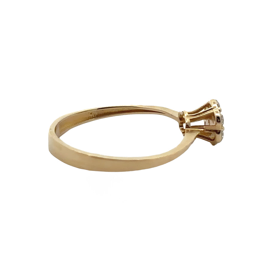 Side view of 14k gold ring with solitaire cubic zirconia