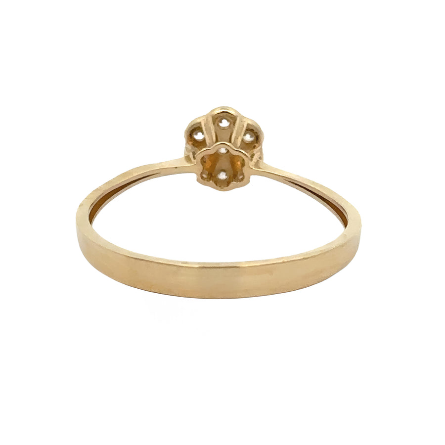 Minimalist 14k gold ring showcasing a sparkling CZ