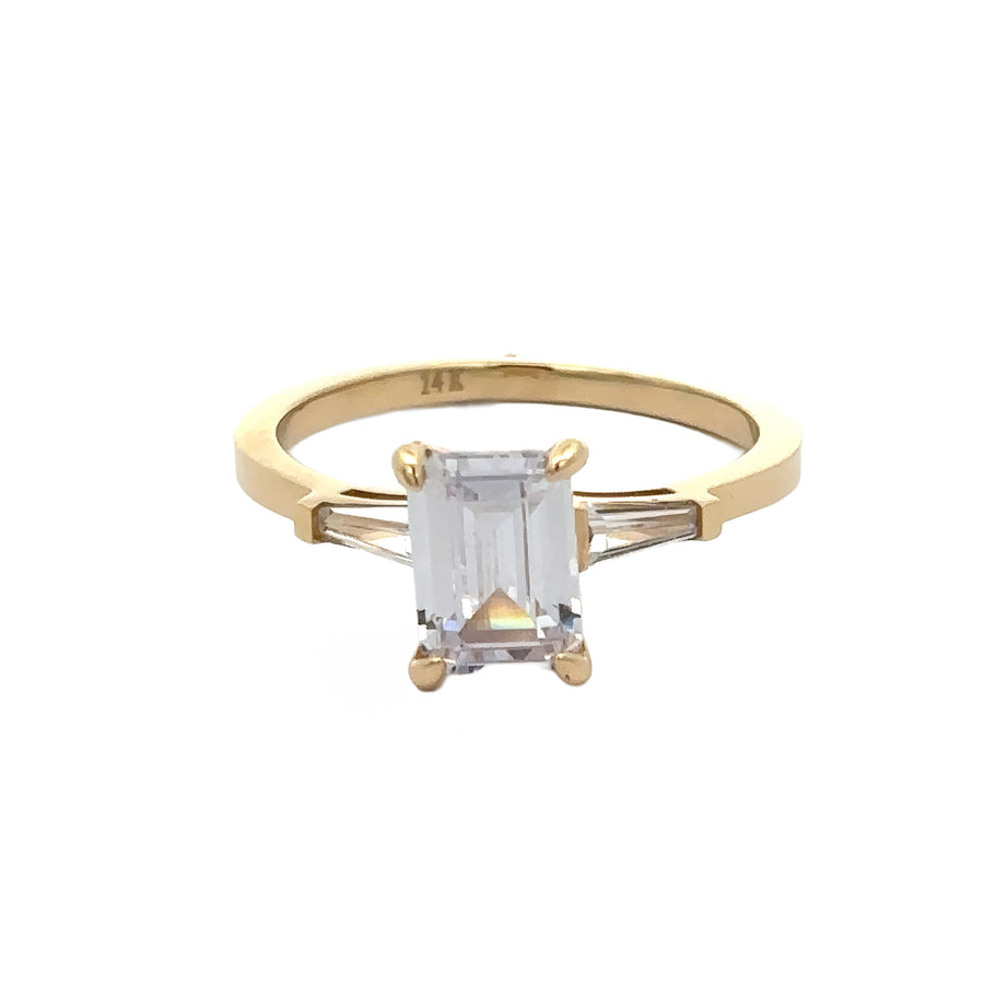 Close-up of dainty gold ring with cubic zirconia stone
