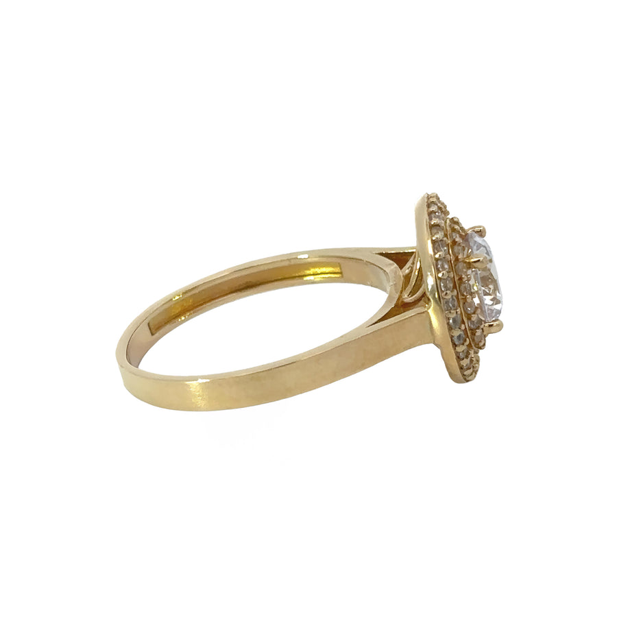 Elegant women’s gold ring with sparkling CZ centerpiece