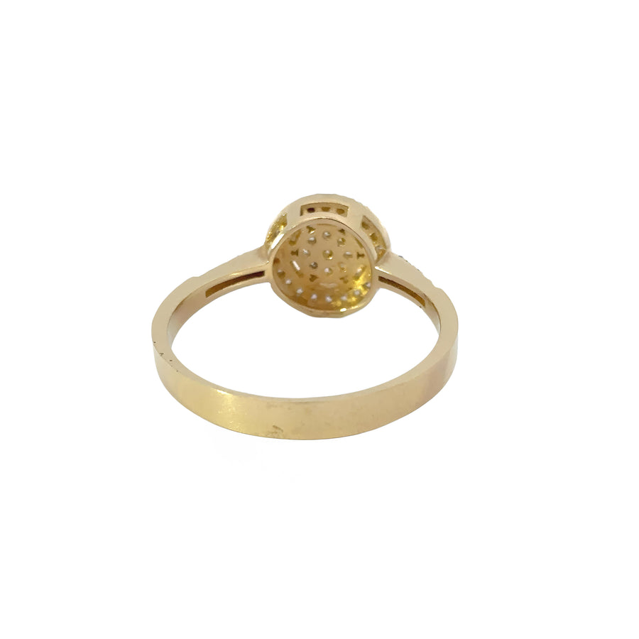 Elegant 14k gold ring featuring sparkling CZ center circle design