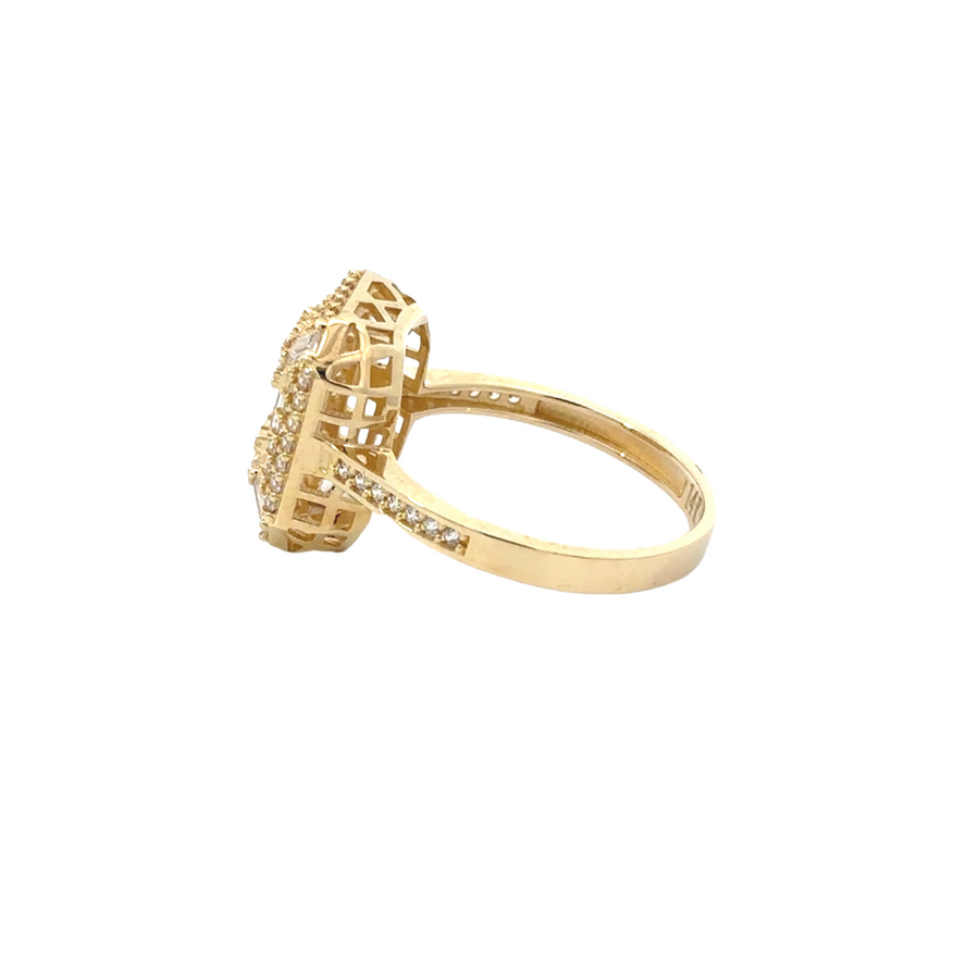 Side view of 14k gold ring, highlighting the delicate cubic zirconia details that add brilliance.