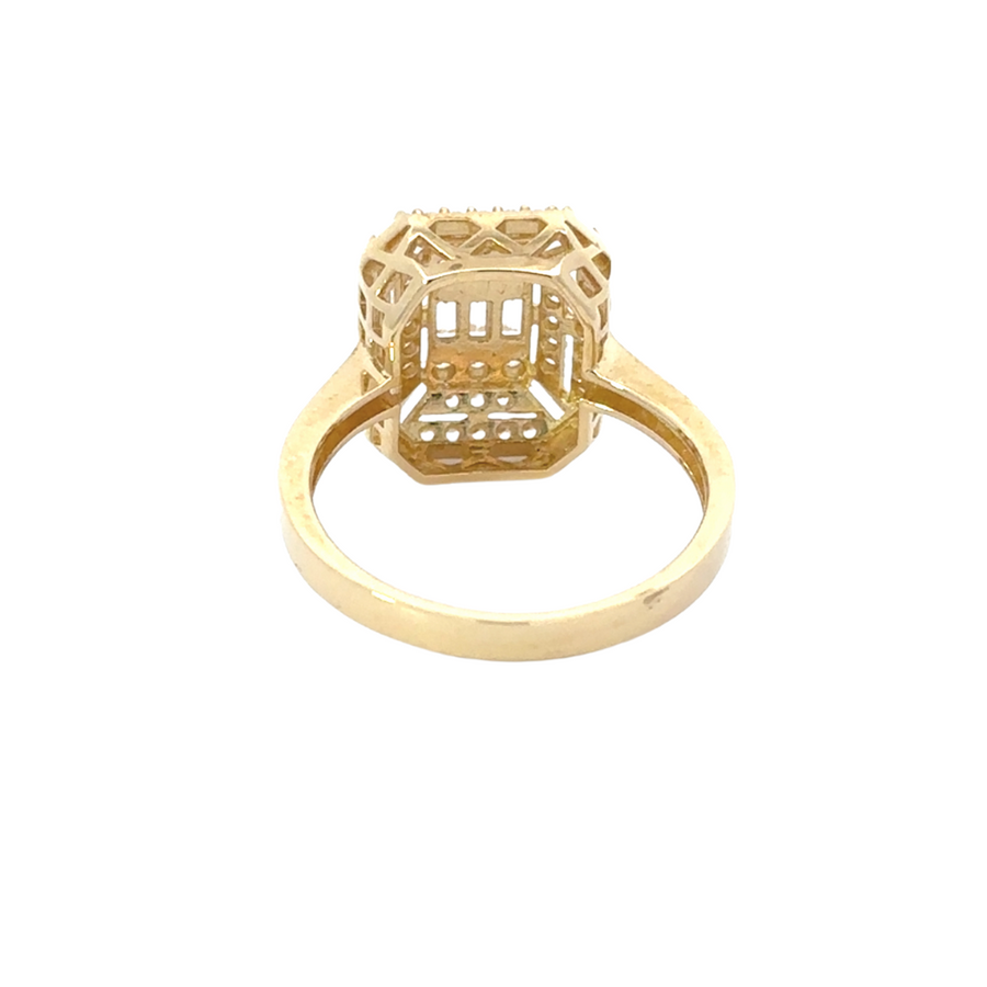 Model wearing 14k gold ring, featuring sparkling CZ accents, paired with casual chic attire.