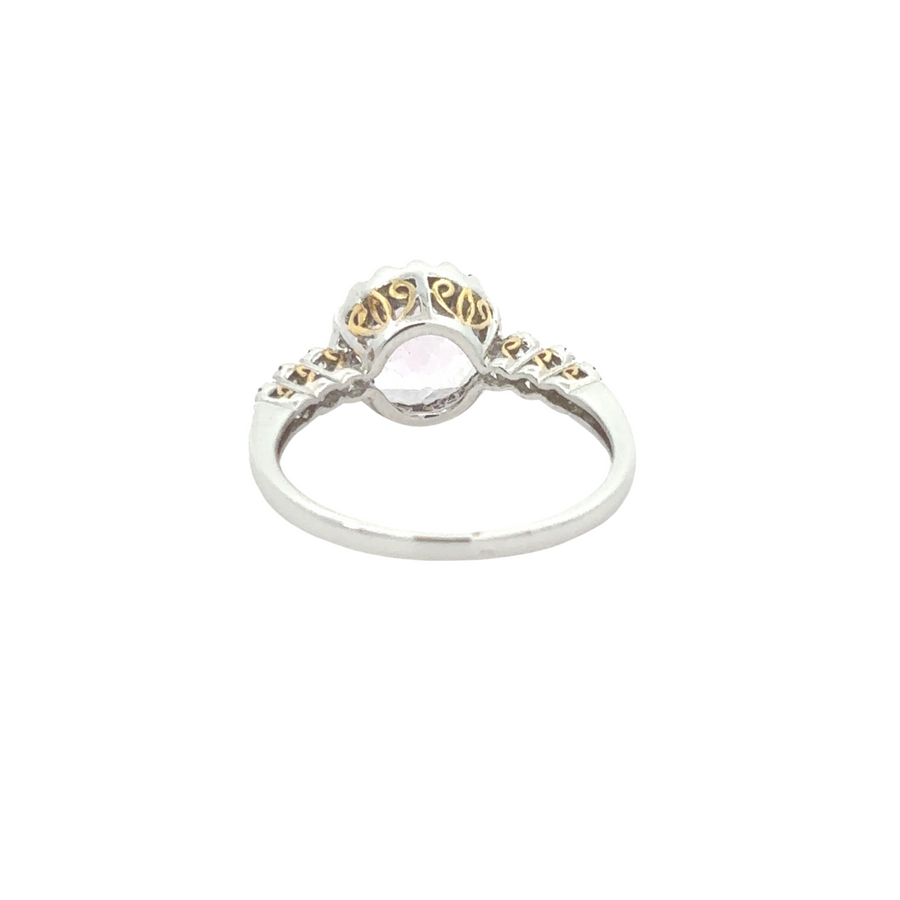 Side view of 14k gold ring showcasing diamond settings