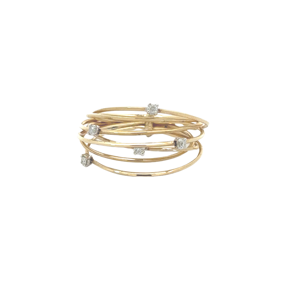 14k gold ring with diamonds close-up on neutral background