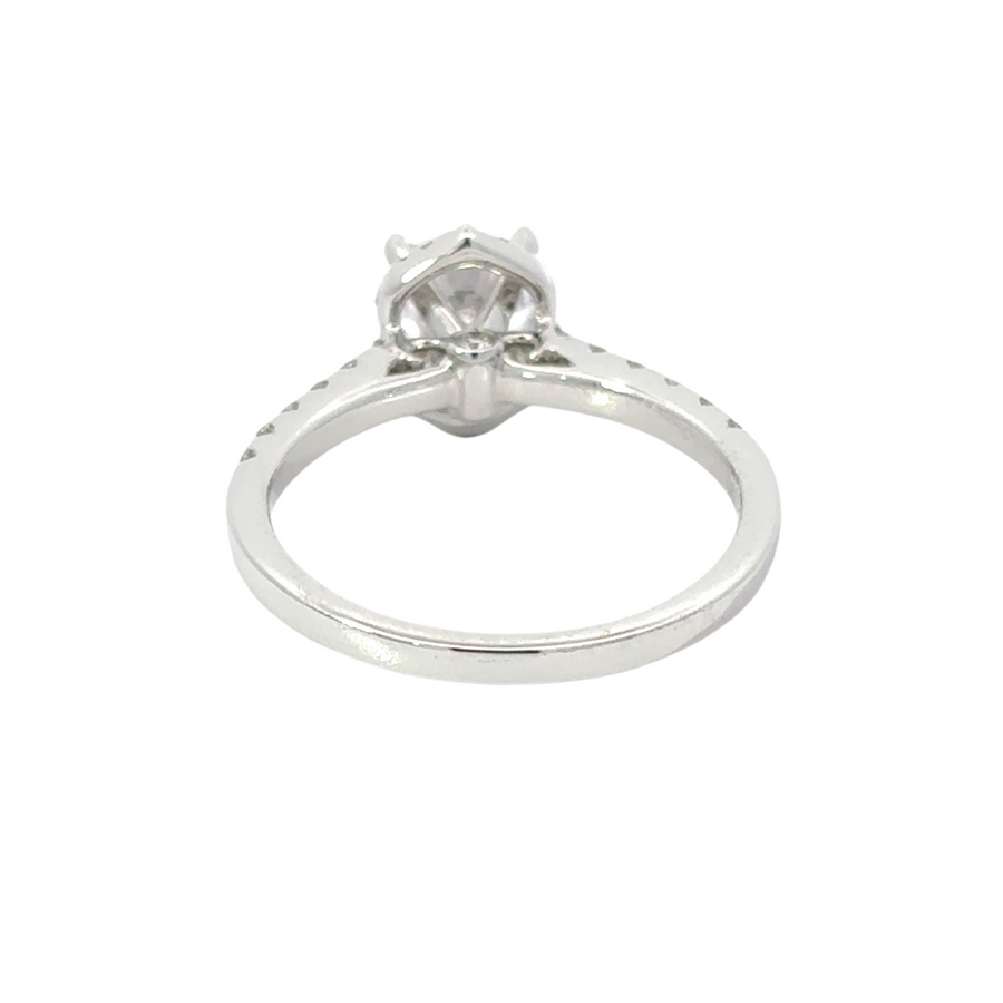 Woman wearing 14k gold ring with dazzling diamond and cubic zirconia accents